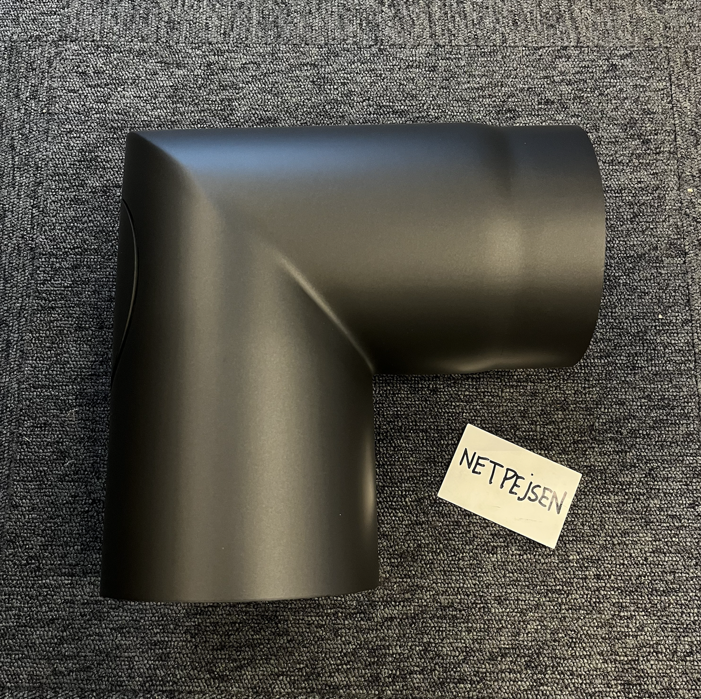 En bøjning med renselem/dør 90 grader knærør. Ø150mm